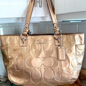 Coach East/West gallery embossed gold tote